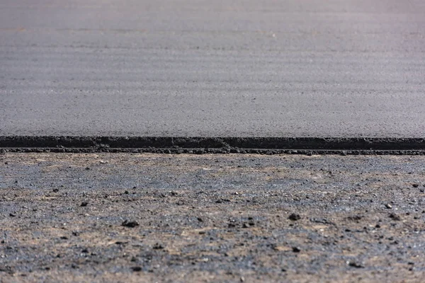 Nova colocação de asfalto — Fotografia de Stock
