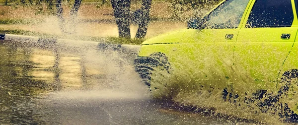 car rain puddle splashing water toning