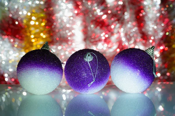 Christmas ball and tinsel — Stock Photo, Image