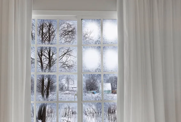 View through a frozen landscape window — Stock Photo, Image