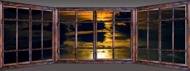 Deniz günbatımı penceresinden