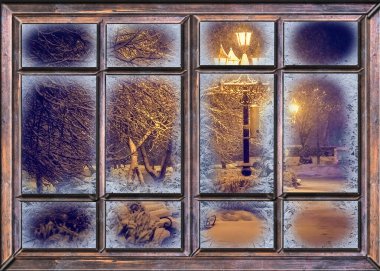 Noel 'den önceki gece donmuş pencere manzarası