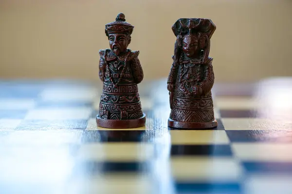 Close Black King Queen Chess Piece Sitting Chessboard — Stock Photo, Image