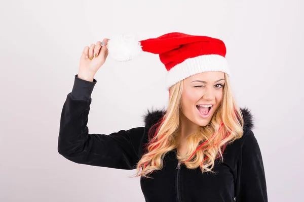 Wesoły młode nastoletnie dziewczyny w Santa hat — Zdjęcie stockowe