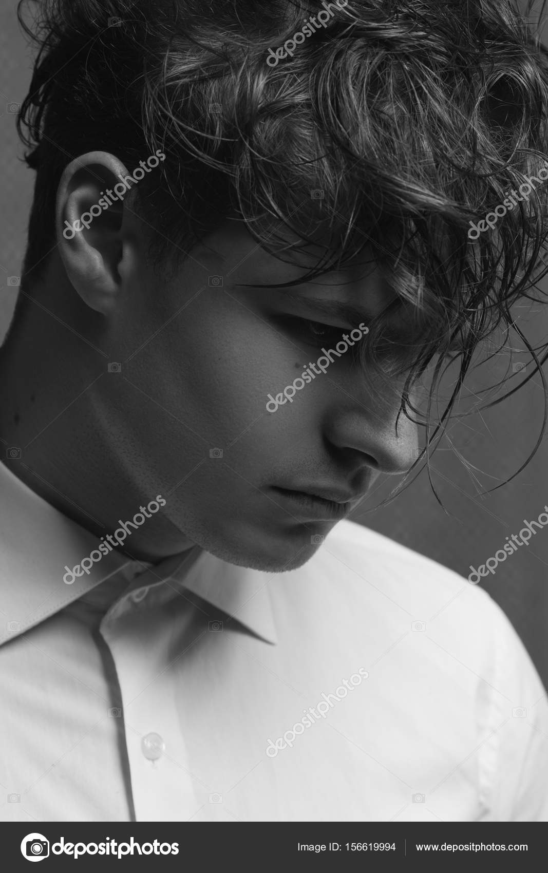 Male beauty concept. Profile portrait of young man with perfect haircut Stock Photo by ©avgustino 156619994 Male beauty concept. Profile portrait of young man with perfect haircut Stock Photo by ©avgustino 156619994