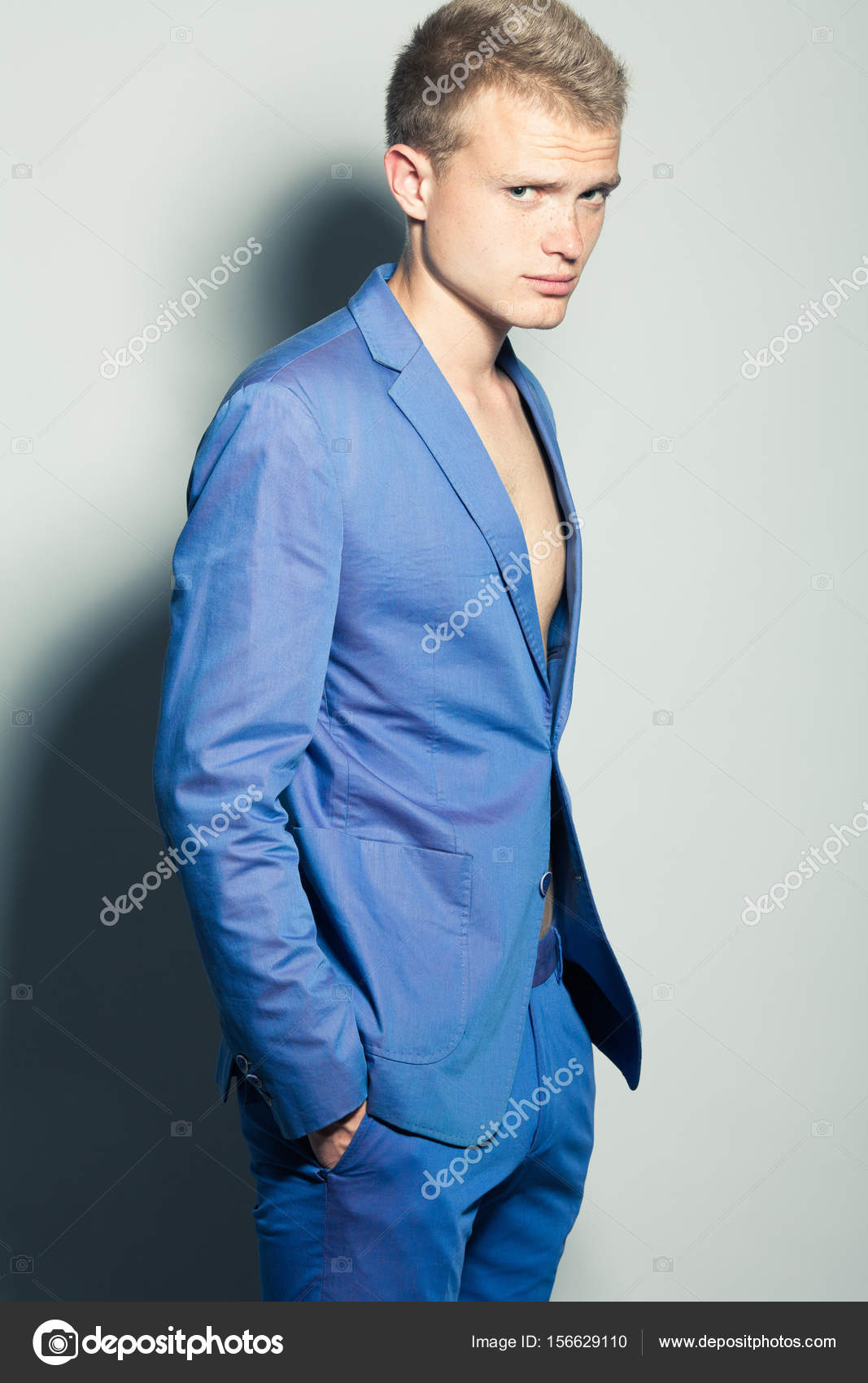 Male beauty concept. Portrait of young man with perfect haircut Stock Photo by ©avgustino 156629110 Male beauty concept. Portrait of young man with perfect haircut Stock Photo by ©avgustino 156629110