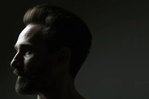 Fabulous at any age. Profile portrait of 40-year-old man standing