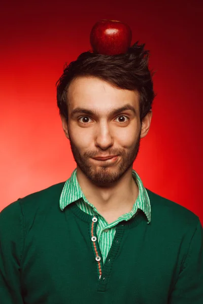 Portrait Happy Mad Student Guy Posing Red Background Apple Head — Stock Photo, Image