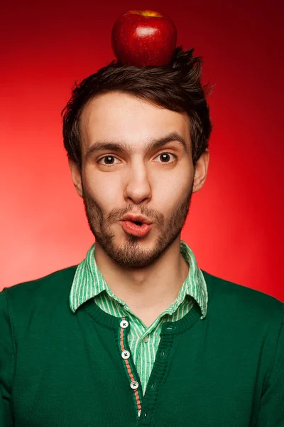 Portrait Happy Mad Student Guy Posing Red Background Apple Head — Stock Photo, Image