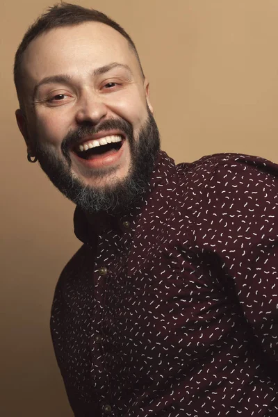 Fabulous at any age concept. Emotive portrait of laughing 40-years old man — ストック写真