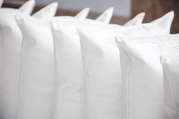 white pillows stack