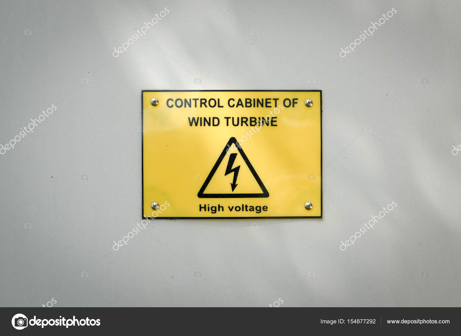 Warning sign of wind turbine cabinet controller Stock Photo by ©jiggo