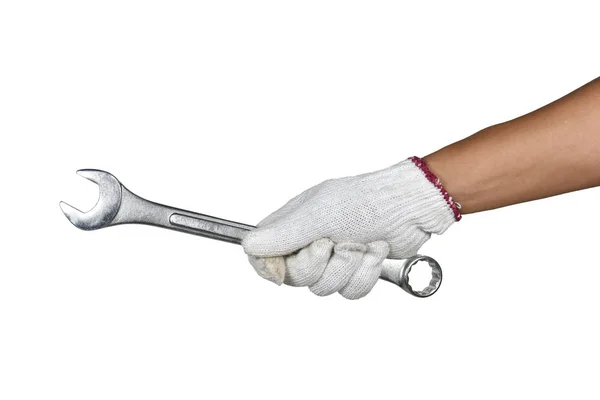 Een hand met bescherming handschoen holding spanner — Stockfoto