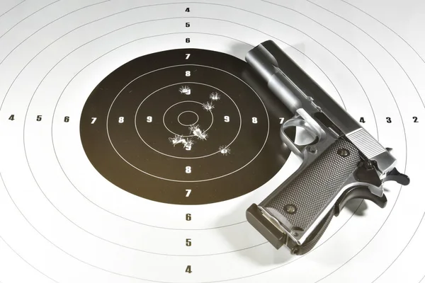 handgun and shooting target