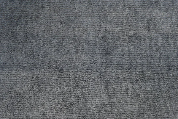 Primer plano plano de textura de tela de microfibra gris para fondo —  Fotos de Stock