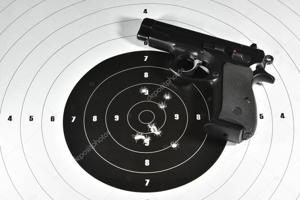 handgun and shooting target