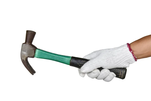 Une main avec un gant de protection tenant un marteau rouillé — Photo