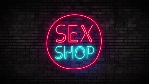 Sex Shop Luz de neón en la pared de ladrillo — Vídeos de Stock