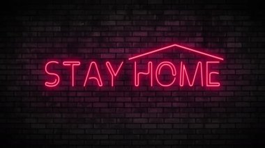 Neon, tuğla duvarda evde kal. Gece kulübü yanıp sönen neon ışığı..