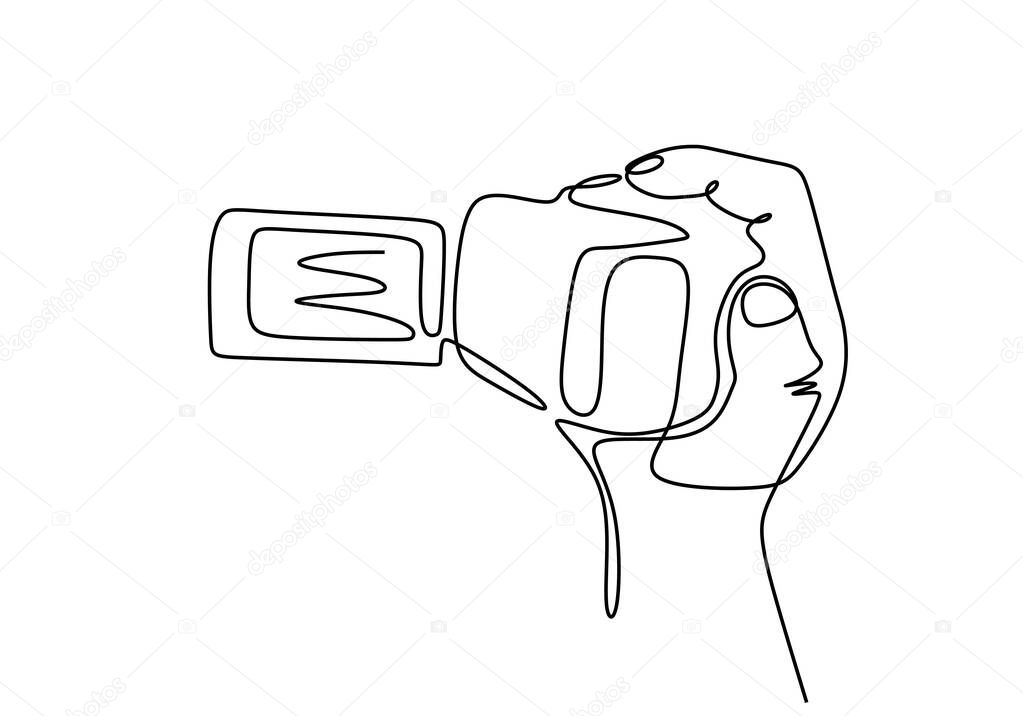 Videographer. Continuous line drawing. Isolated on the white background. Digital handycam or camrecorder video camera.