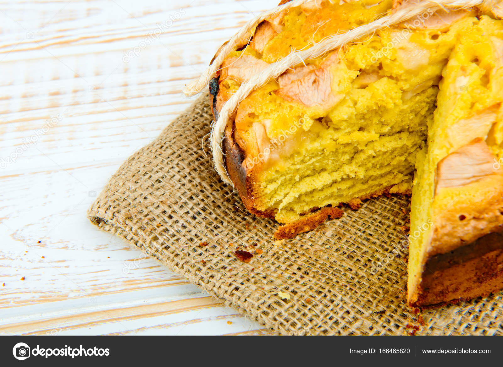 Fresh Bakery Close Up Of Baked Pie With Apples On Sackcloth On A