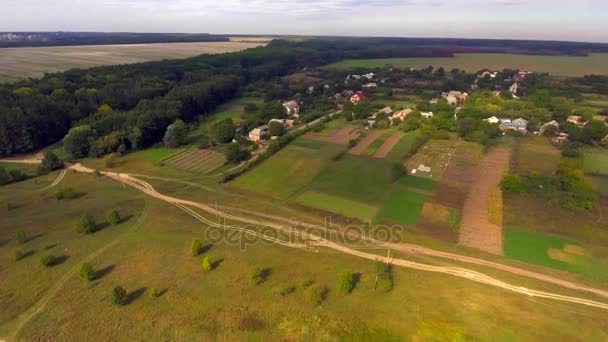 Aerial view of a beautiful landscape of typical village, river and clouds. — Stock Video