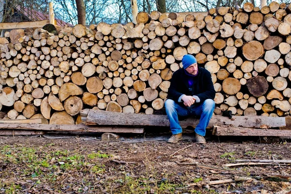 Man Woodcutter Sitting Pile Firewood — Stock Photo, Image