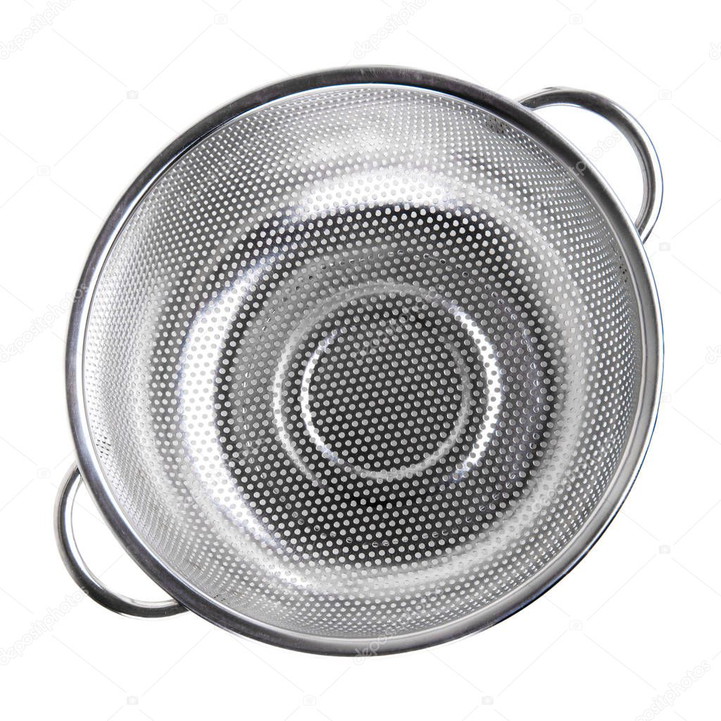 A middle metal colander on a white isolated background. Kitchen accessories.