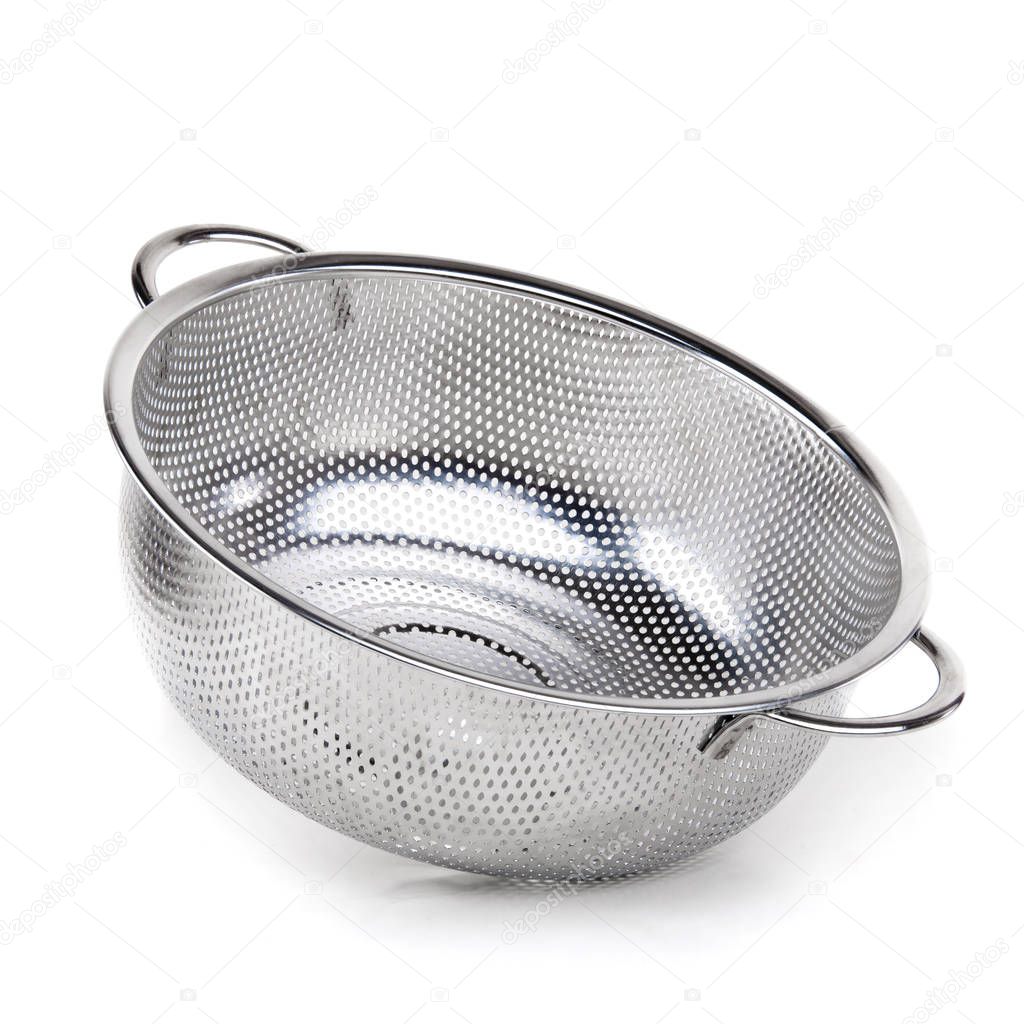 A middle metal colander on a white isolated background. Kitchen accessories.