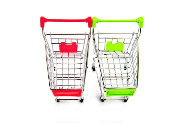 Twee Lege Rood Groen Winkelwagentje Geïsoleerd Witte Achtergrond — Stockfoto