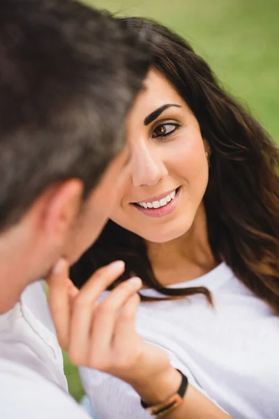 An in love caressing her boyfriend — Stock Photo, Image
