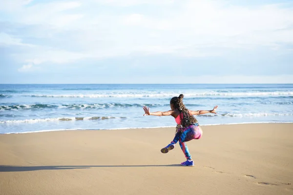 Woman practicing balance yoga exercise — Stock Photo, Image