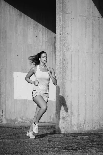 Woman on urban running training — Stock Photo, Image