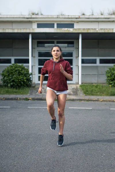 Female Athlete Running Place Sporty Young Woman Training Asphalt — 스톡 사진