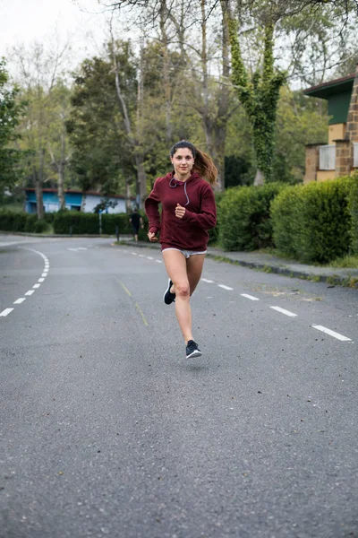 Young Female Athlete Running Urban Suburbs Autumn — 스톡 사진