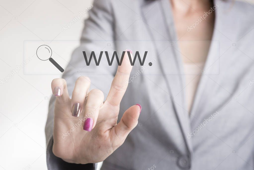 Female hand touching a web search bar with www and magnifying gl
