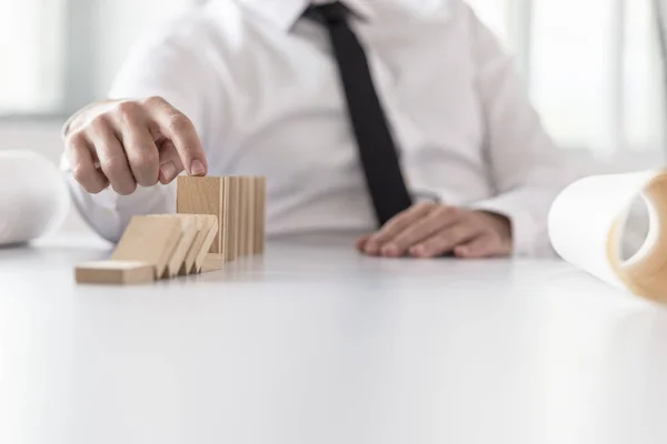 Businessman wearing white shirt and black necktie interrupting d — Stock Photo, Image