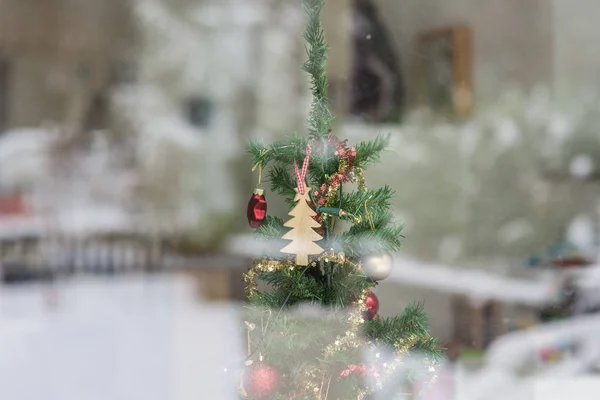 Christmas tree decorated with seasonal ornaments — Stock Photo, Image