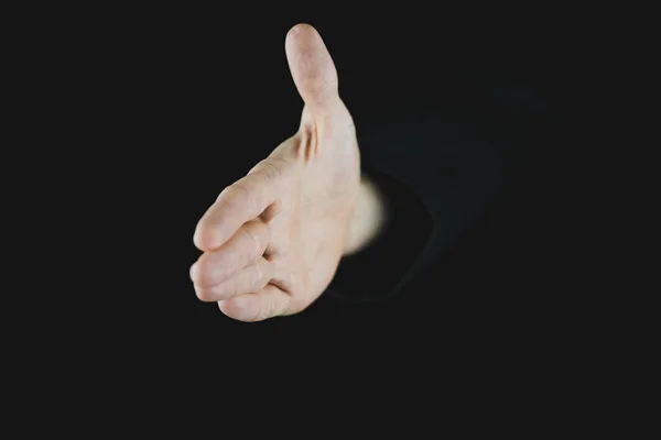 Hand of a businessman offering a handshake — Stock Photo, Image