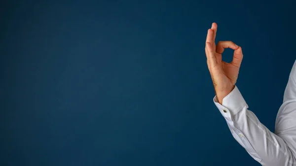 Hand Businessman Showing Gesture His Fingers Blue Background Plenty Copy — Stock Photo, Image