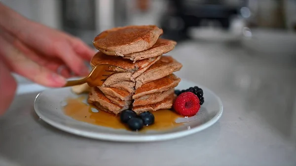 Pancakes Sprinkled Honey Raspberries Plate Cut Fork Eat — Stock Photo, Image