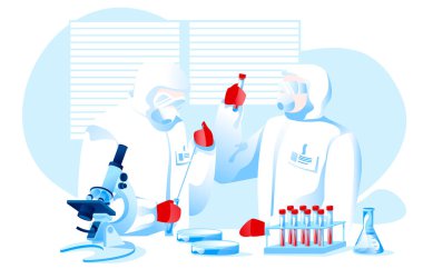 Koruyucu giysi giyen iki bilim adamı salgın için aşı üretiyor.