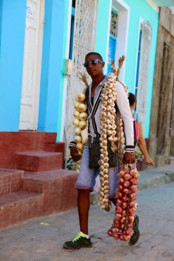 Garlic and Onion Vendor, Cuba clipart