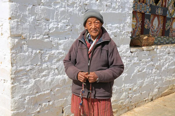 Budist Hacı Tapınağı, Bhutan çember ise boncuk ile dua ediyor