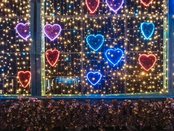 Colorful love decorations at christmas night on bridge in Wroclaw