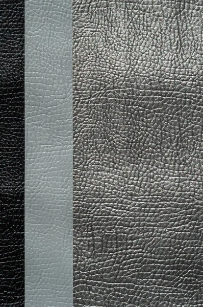 Catalogue de nuances noir foncé similicuir. Cuir échantillons texture. Contexte industriel — Photo