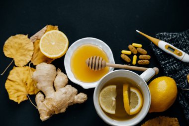 Hastalık kavramı: çay limon, termometre, zencefil, eşarp, sekme