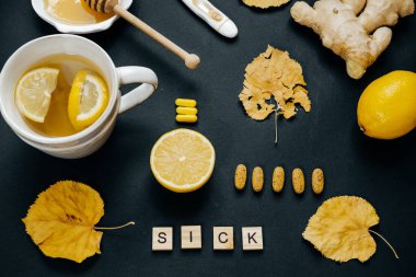 Tahta hasta kelime, tatlım, çay limon, termometre, zencefil, ta