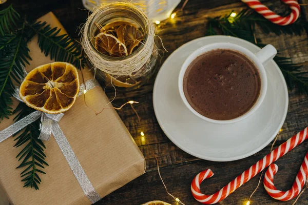 Christmas decor with hot chocolate present, candy canes and Fir — Stock Photo, Image