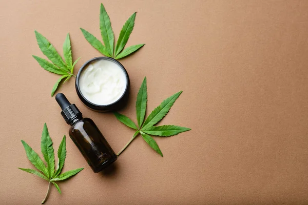 Top View Cannabis Cosmetic Oil Cream Jar Bottle Green Plant — Stock Photo, Image